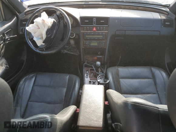 1999 Mercedes-Benz C z VIN WDBHA33E5XF777031, wystawiony jako Copart lot #57914774 z przebiegiem Nie podano mil oraz Szkoda całkowita • Salvage title. Historia ofert i sprzedaży dostępna na DreamBid. Obrazek 8.