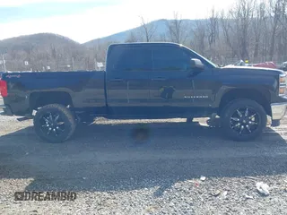 2014 Chevrolet Silverado 1500 LT with VIN 1GCVKREH4EZ338281, listed as a IAAI auction lot 41581754 with 126,786 mi miles and . Bid and sale history available at DreamBid. Image 13.