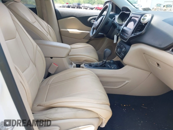 2020 Jeep Cherokee Latitude with VIN 1C4PJMCBXLD651472, listed as a IAAI auction lot 42590047 with 68,947 mi miles and . Bid and sale history available at DreamBid. Image 5.