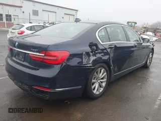 2019 BMW 7 Series 740i xDrive with VIN WBA7E4C52KGV70359, listed as a IAAI auction lot 41421504 with 55,734 mi miles and . Bid and sale history available at carsss.com. Image 4.