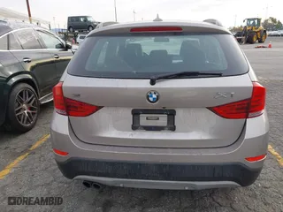 2015 BMW X1 xDrive28i with VIN WBAVL1C55FVY41749, listed as a IAAI auction lot 40977221 with 120,924 mi miles. Bid and sale history available at carsss.com. Image 16.