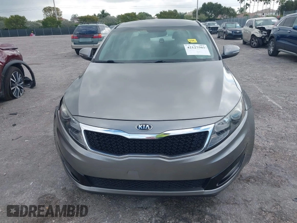 2013 Kia Optima LX z VIN 5XXGM4A74DG147688, wystawiony jako IAAI lot #42127503 z przebiegiem 148 705 mil mil oraz . Historia ofert i sprzedaży dostępna na DreamBid. Obrazek 12.