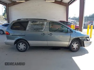 1999 Toyota Sienna LE with VIN 4T3ZF13C4XU166786, listed as a IAAI auction lot 42057995 with 316,259 mi miles. Bid and sale history available at carsss.com. Image 13.