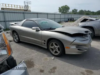2001 Pontiac Firebird Formula z VIN 2G2FV22G912123611, wystawiony jako Copart lot #56820064 z przebiegiem 55 319 mil mil oraz Szkody całkowita. Historia ofert i sprzedaży dostępna na DreamBid. Obrazek 4.
