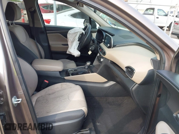 2020 Hyundai Santa Fe SE with VIN 5NMS23AD6LH220012, listed as a IAAI auction lot 42317046 with 141,055 mi miles and . Bid and sale history available at DreamBid. Image 5.