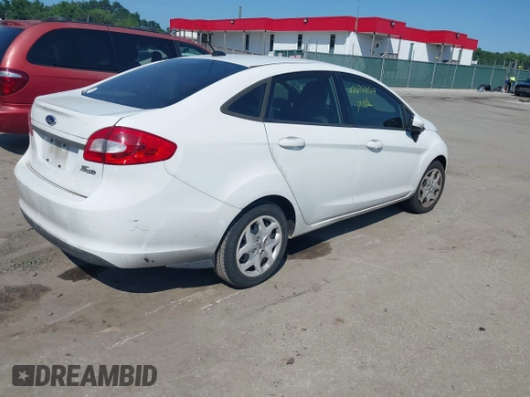 2013 Ford Fiesta S with VIN 3FADP4AJ7DM184180, listed as a IAAI auction lot 42632804 with 176,729 mi miles and . Bid and sale history available at DreamBid. Image 4.