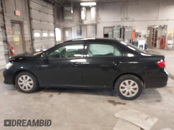 2009 Toyota Corolla with VIN 1NXBU40E29Z133733, listed as a IAAI auction lot 42093904 with 229,509 mi miles. Bid and sale history available at carsss.com. Image 14.