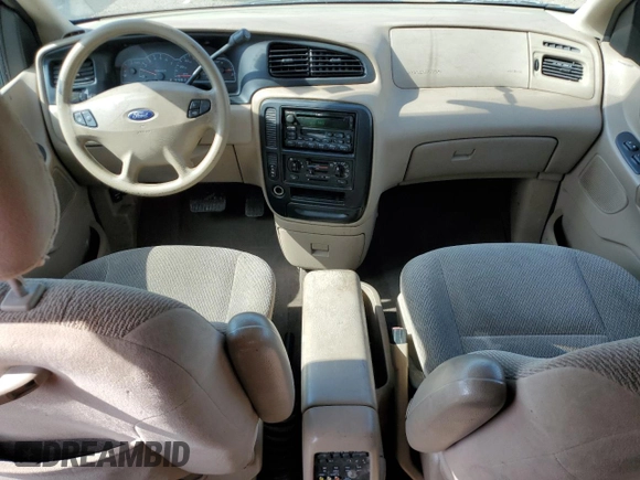 2003 Ford Windstar LX with VIN 2FMZA51413BB77562, listed as a Copart auction lot 56861095 with 170,562 mi miles and Salvage title. Bid and sale history available at DreamBid. Image 8.