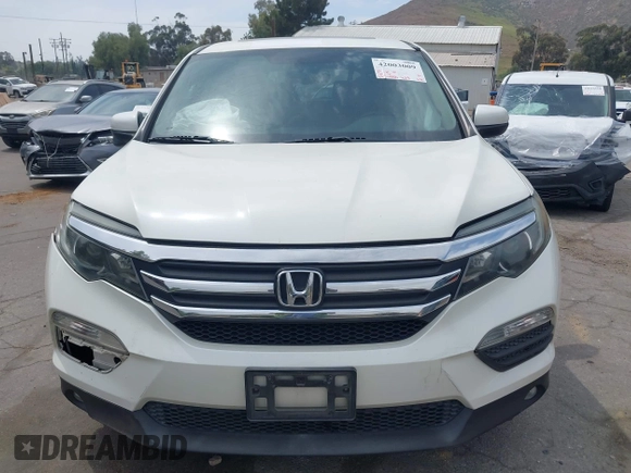 2016 Honda Pilot EX-L with VIN 5FNYF5H55GB015166, listed as a IAAI auction lot 42003009 with 142,488 mi miles and . Bid and sale history available at DreamBid. Image 11.