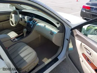 2001 Toyota Avalon XL w/Bucket Seats with VIN 4T1BF28B61U169213, listed as a IAAI auction lot 41829245 with 99,940 mi miles. Bid and sale history available at carsss.com. Image 5.