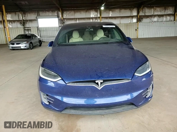 2016 Tesla Model X 70D z VIN 5YJXCAE20GF002753, wystawiony jako Copart lot #50954795 z przebiegiem 77 256 mil mil oraz Szkody całkowita. Historia ofert i sprzedaży dostępna na DreamBid. Obrazek 11.