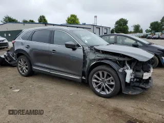 2017 Mazda CX-9 Signature с VIN JM3TCBEY3H0127651, выставлен на аукционе Copart как лот 62814425 с пробегом 171 263 миль миль и Списание • Salvage title. История ставок и продаж доступна на DreamBid. Изображение 4.