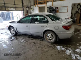 2001 Saturn SL with VIN 1G8ZK54791Z298951, listed as a Copart auction lot 89198795 with 157,208 mi miles and Salvage title. Bid and sale history available at DreamBid. Image 2.