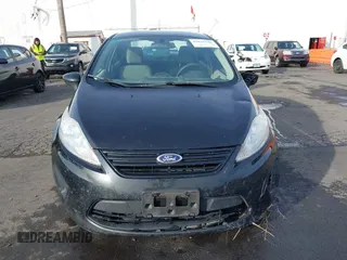 2013 Ford Fiesta S z VIN 3FADP4AJ7DM178265, wystawiony jako IAAI lot #41610346 z przebiegiem 115 963 mil mil oraz . Historia ofert i sprzedaży dostępna na DreamBid. Obrazek 12.