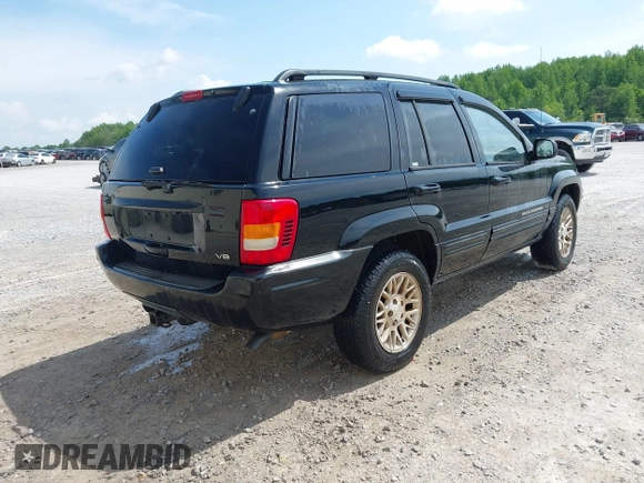2002 Jeep Grand Cherokee Limited with VIN 1J8GX58N32C130002, listed as a IAAI auction lot 42179840 with 246,661 mi miles and . Bid and sale history available at DreamBid. Image 4.