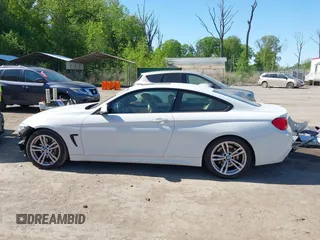 2014 BMW 4 Series 435i z VIN WBA3R1C51EK192103, wystawiony jako IAAI lot #42127351 z przebiegiem 99 023 mil mil oraz . Historia ofert i sprzedaży dostępna na DreamBid. Obrazek 14.