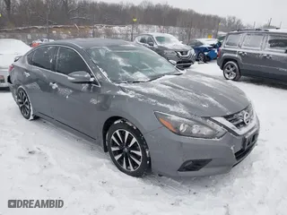 2018 Nissan Altima 2.5 SV with VIN 1N4AL3AP0JC136949, listed as a IAAI auction lot 41572923 with 69,000 mi miles. Bid and sale history available at carsss.com. Image 1.