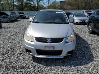 2007 Suzuki SX4 z VIN JS2YB413175106909, wystawiony jako Copart lot #55733055 z przebiegiem 152 703 mil mil oraz Tytuł czysty. Historia ofert i sprzedaży dostępna na DreamBid. Obrazek 5.