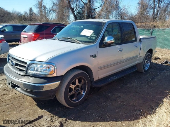 2002 Ford F-150 XLT with VIN 1FTRW07L42KA48341, listed as a IAAI auction lot 41433160 with 244,755 mi miles. Bid and sale history available at carsss.com. Image 2.