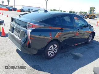 2018 Toyota Prius Two with VIN JTDKBRFU9J3061915, listed as a IAAI auction lot 41840107 with 62,782 mi miles and . Bid and sale history available at carsss.com. Image 4.