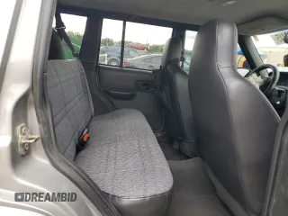 2001 Jeep Cherokee Sport with VIN 1J4FF48S91L592966, listed as a Copart auction lot 58996445 with 159,140 mi miles and Salvage title. Bid and sale history available at DreamBid. Image 11.