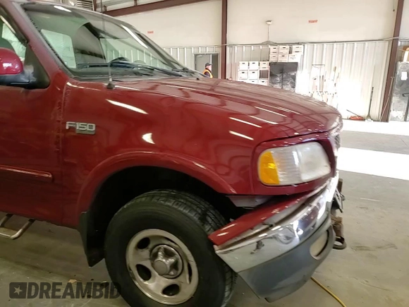 1999 Ford F-150 with VIN 1FTRF18W8XNB97257, listed as a Copart auction lot 87857815 with Not provided miles and Salvage title. Bid and sale history available at DreamBid. Image 11.