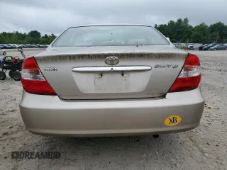 2004 Toyota Camry LE with VIN 4T1BE32K04U818252, listed as a Copart auction lot 64758924 with 0 mi miles and Non Repairable. Bid and sale history available at carsss.com. Image 6.