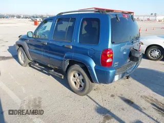 2004 Jeep Liberty Limited with VIN 1J4GL58K34W235515, listed as a IAAI auction lot 41863833 with 200,935 mi miles. Bid and sale history available at carsss.com. Image 3.