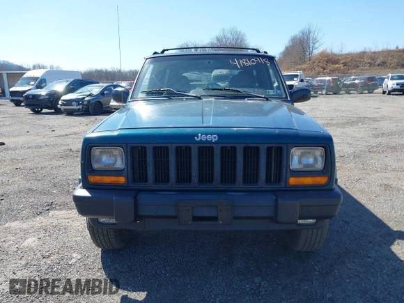 1998 Jeep Cherokee Sport z VIN 1J4FJ68S2WL136129, wystawiony jako IAAI lot #41810918 z przebiegiem 269 989 mil mil oraz . Historia ofert i sprzedaży dostępna na DreamBid. Obrazek 6.