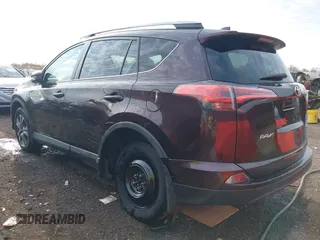 2017 Toyota RAV4 LE with VIN 2T3BFREV9HW600006, listed as a IAAI auction lot 40718177 with 122,119 mi miles. Bid and sale history available at carsss.com. Image 3.