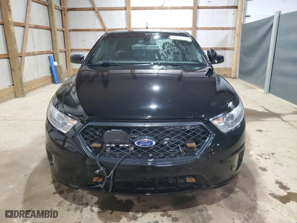 2014 Ford Sedan Police Interceptor with VIN 1FAHP2MKXEG138252, listed as a Copart auction lot 86404964 with 256,199 mi miles and Clean Title. Bid and sale history available at carsss.com. Image 5.