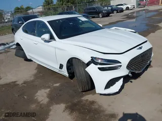 2023 Genesis G70 2.0T with VIN KMTG34TA8PU128279, listed as a IAAI auction lot 41523117 with 34,038 mi miles. Bid and sale history available at carsss.com. Image 1.