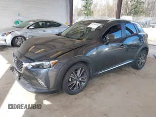 2017 Mazda CX-3 Grand Touring z VIN JM1DKFD70H0150496, wystawiony jako IAAI lot #41746038 z przebiegiem 108 091 mil mil oraz . Historia ofert i sprzedaży dostępna na DreamBid. Obrazek 18.
