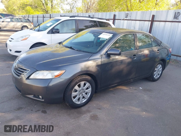 2007 Toyota Camry LE with VIN 4T1BK46K27U044809, listed as a IAAI auction lot 42151495 with 247,984 mi miles and . Bid and sale history available at DreamBid. Image 2.