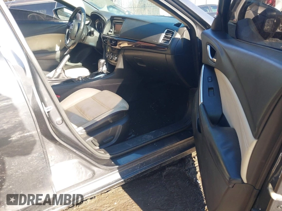 2014 Mazda 6 i Grand Touring with VIN JM1GJ1W67E1137886, listed as a IAAI auction lot 41405112 with 159,879 mi miles and . Bid and sale history available at DreamBid. Image 5.