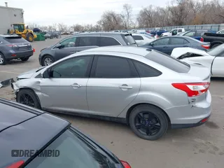 2013 Ford Focus SE with VIN 1FADP3F20DL361469, listed as a IAAI auction lot 41457037 with 127,852 mi miles. Bid and sale history available at carsss.com. Image 14.