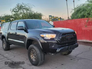 2023 Toyota Tacoma SR with VIN 3TMCZ5AN0PM601281, listed as a Copart auction lot 66415915 with 49,406 mi miles and Clean title. Bid and sale history available at DreamBid. Image 1.