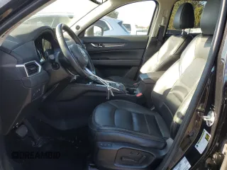2019 Mazda CX-5 Grand Touring with VIN JM3KFBDM0K0571806, listed as a Copart auction lot 43395105 with 57,768 mi miles and Salvage Title. Bid and sale history available at carsss.com. Image 7.