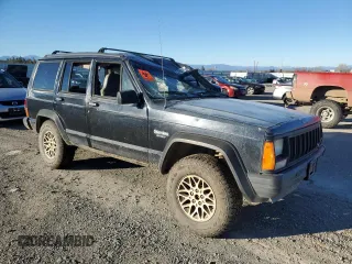 1996 Jeep Cherokee Sport with VIN 1J4FJ68SXTL274898, listed as a Copart auction lot 87676505 with 258,358 mi miles and Salvage Title. Bid and sale history available at carsss.com. Image 4.