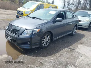 2010 Toyota Corolla with VIN 2T1BU4EE8AC459793, listed as a IAAI auction lot 41967607 with 202,762 mi miles. Bid and sale history available at carsss.com. Image 2.