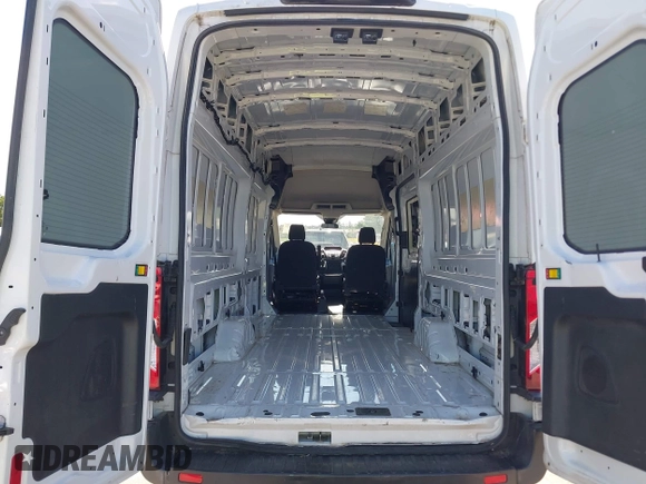 2018 Ford Transit Cargo с VIN 1FTBW3XG0JKA74049, выставлен на аукционе IAAI как лот 42607175 с пробегом 79 297 миль миль и . История ставок и продаж доступна на DreamBid. Изображение 8.