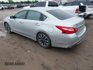 2016 Nissan Altima SR with VIN 1N4AL3AP9GC197161, listed as a IAAI auction lot 42147833 with 135,700 mi miles and . Bid and sale history available at DreamBid. Image 3.