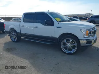 2018 Ford F-150 XL with VIN 1FTEW1C59JKD98218, listed as a IAAI auction lot 41406012 with 103,435 mi miles. Bid and sale history available at carsss.com. Image 1.