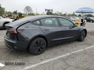 2025 Tesla Model 3 Long Range with VIN 5YJ3E1EA7SF969403, listed as a Copart auction lot 55348185 with 2,613 mi miles and Salvage title. Bid and sale history available at DreamBid. Image 3.