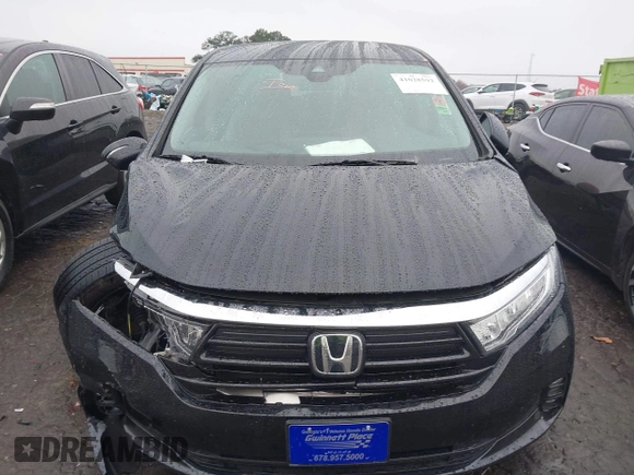 2021 Honda Odyssey EX with VIN 5FNRL6H53MB010305, listed as a IAAI auction lot 41028592 with 39,368 mi miles and . Bid and sale history available at DreamBid. Image 12.