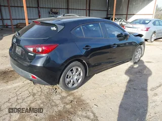 2014 Mazda 3 i Sport with VIN JM1BM1K74E1192943, listed as a IAAI auction lot 41629944 with 132,236 mi miles and . Bid and sale history available at carsss.com. Image 4.