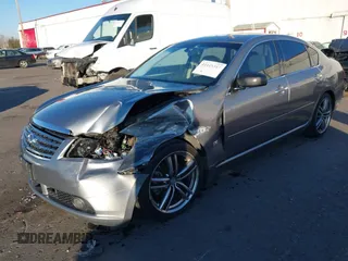 2006 Infiniti M z VIN JNKAY01E56M107083, wystawiony jako IAAI lot #41443347 z przebiegiem 162 191 mil mil oraz . Historia ofert i sprzedaży dostępna na DreamBid. Obrazek 6.