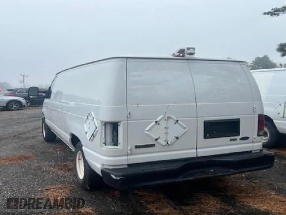 2010 Ford Econoline Cargo Commercial with VIN 1FTNE1EW4ADA90760, listed as a IAAI auction lot 41809385 with 187,114 mi miles. Bid and sale history available at carsss.com. Image 3.