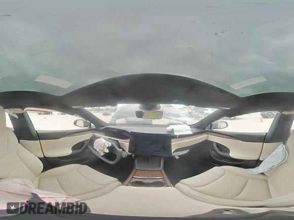 2023 Tesla Model S z VIN 5YJSA1E58PF531166, wystawiony jako Copart lot #51827565 z przebiegiem Nie podano mil oraz Szkoda całkowita • Salvage title. Historia ofert i sprzedaży dostępna na DreamBid. Obrazek 12.