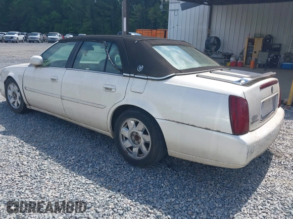 2000 Cadillac DeVille DTS z VIN 1G6KF5792YU216318, wystawiony jako IAAI lot #42134531 z przebiegiem 167 518 mil mil oraz . Historia ofert i sprzedaży dostępna na DreamBid. Obrazek 3.
